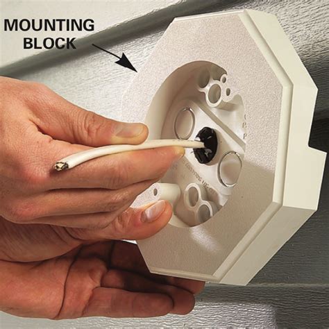 how to mount electrical box to vinyl siding|vinyl siding doorbell mounting block.